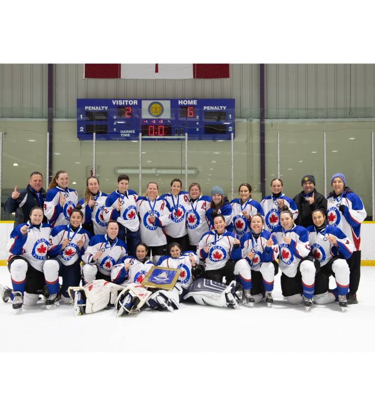  8 Wing Flyers women’s hockey team 