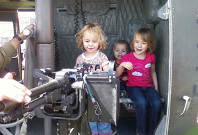 children with military equipment