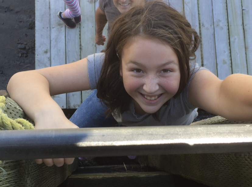 Even as a little girl, I prided myself in pushing my limits. This is me climbing a ladder despite my fear of heights.