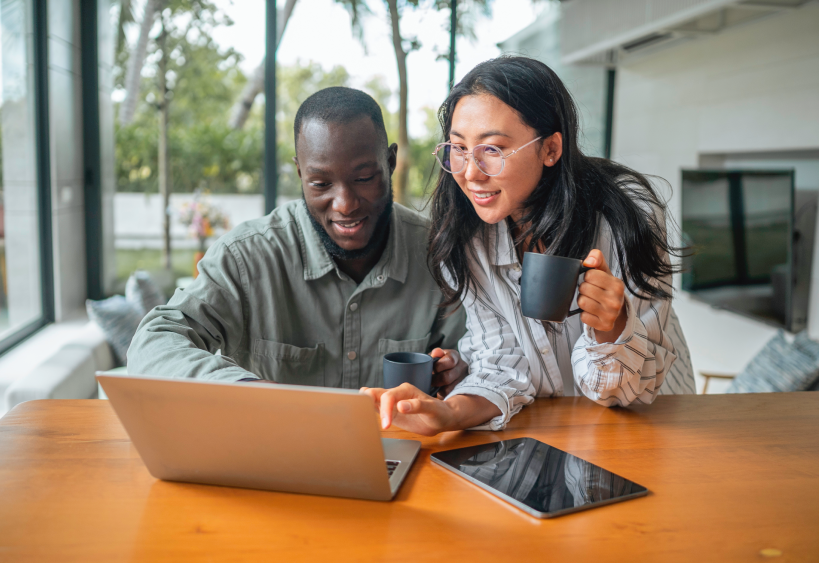 Couple looking at a computer