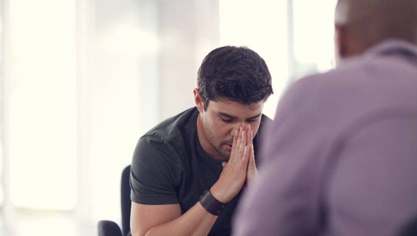 man sitting on a couch
