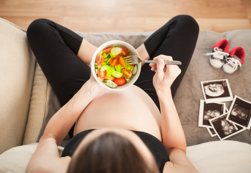 Pregnant women with a healthy bowl