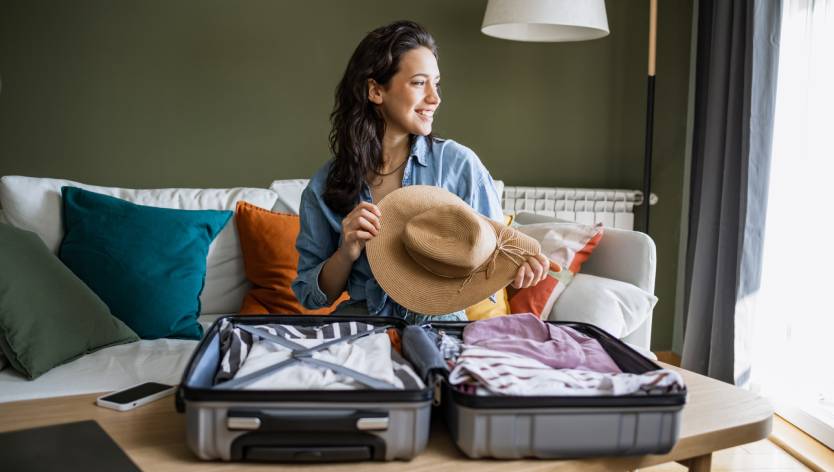 woman behind a suitcase