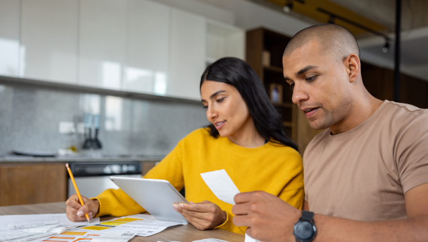 A couple looking at bills