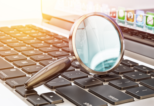 Magnifying glass on a keyboard