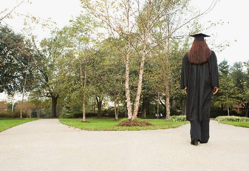 Female graduate walking