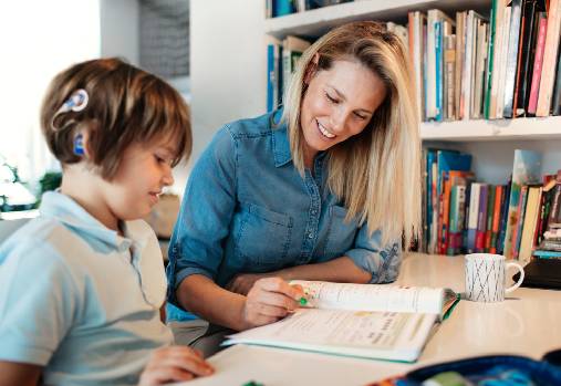 Mother And Her Son Doing Homework
