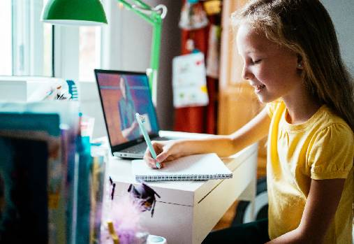 Young girl using laptop
