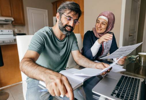 Couple in front of a computer