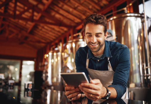 Man looking at his tablet