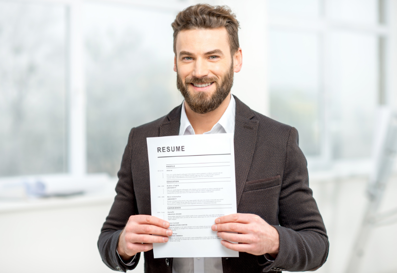 Man holding a resume