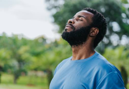 Man taking a breath of fresh air