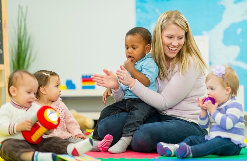 woman playing with kids