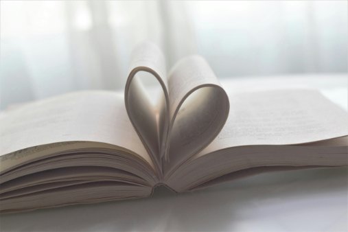 Pages of a book folded into a heart